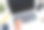 用笔记本电脑工作的高级女性的手。白色的桌子上。喝点咖啡休息一下。选择户外办公室。把手机和耳机放在身边图片下载