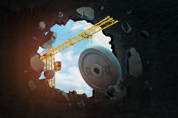 建筑起重机的3d渲染和20公斤的重量板打破黑墙图片下载