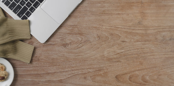 俯视图舒适的工作空间与复制空间和笔记本电脑图片下载