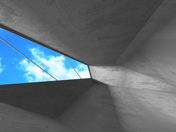 阴天背景下的混凝土房墙施工图片下载