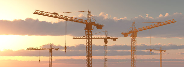 日落时的建筑起重机图片下载