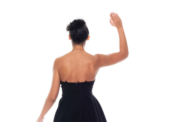 后视图/一个人/腰部以上的20-29岁的成年美丽的非洲裔/非洲裔女性/年轻女性在白色背景穿着衣服/凉爽的态度和问候图片下载