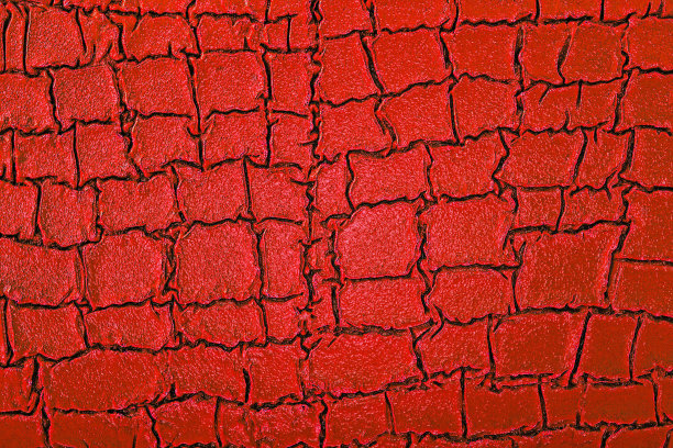 暗红色的鳄鱼皮。皮肤如爬行动物质地。图片下载