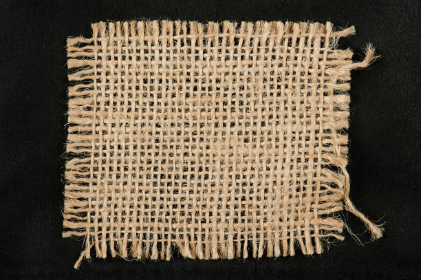 黑色背景上的亚麻布图片下载