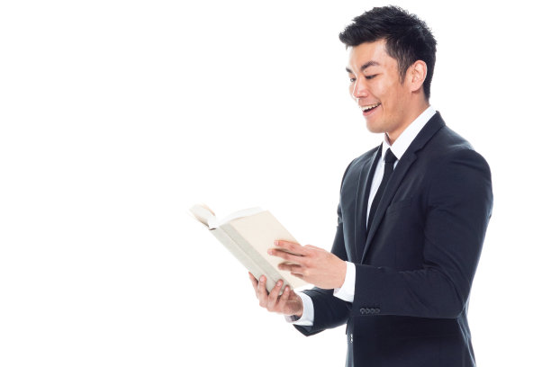 低头/一人/一人/腰部以上的20-29岁的成年英俊的人中国种族/东亚种族男性/年轻男子经理/商人/商人站在白色背景穿着西装图片下载