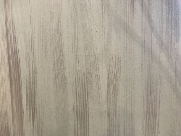 浅棕色的木墙，表面有深棕色的线条和黑色的阴影图片下载