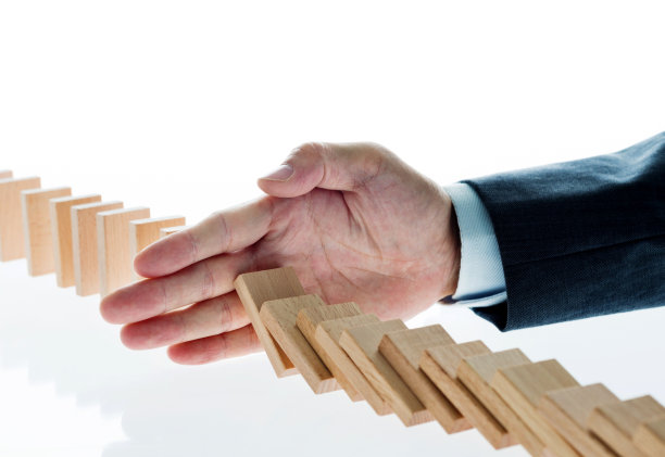 商人手停多米诺效应图片下载