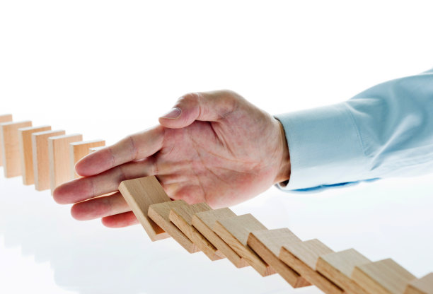 商人手停多米诺效应图片下载