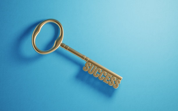 蓝色背景上的青铜成功键图片下载