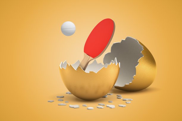 乒乓球拍的3d渲染和球孵化出金色的蛋在黄色的背景图片下载