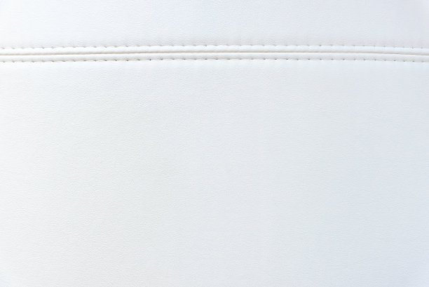 背景与白色人造皮革，近距离照片图像。图片的白色生态皮革。粗粒结构图片下载