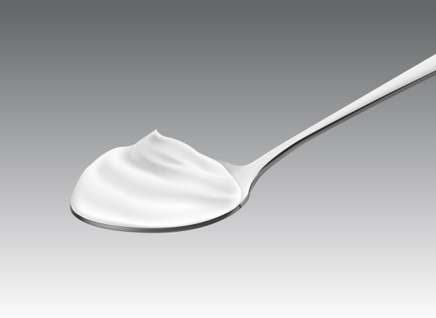 奶油泡沫金属勺。图片下载