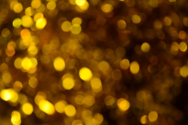 散景。节日的背景。圣诞灯。闪闪发光。散焦蓝宝石。新年的背景。节日的壁纸。眨眼。狂欢节。金属丝。散景复古风格照片。金。黄金。图片下载
