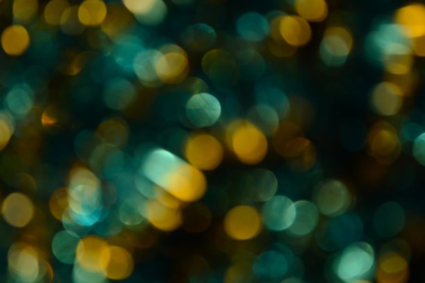 散景。节日的背景。圣诞灯。闪闪发光。散焦蓝宝石。新年的背景。节日的壁纸。眨眼。狂欢节。金属丝。散景复古风格照片。金。黄金。图片下载