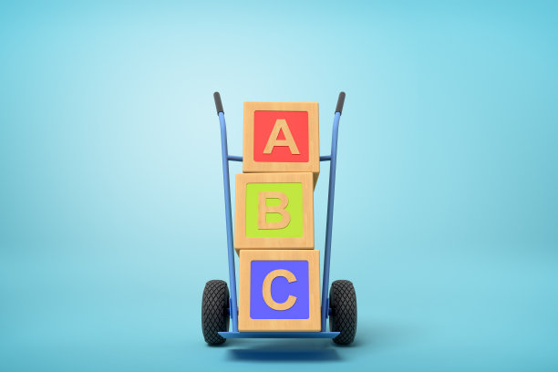 彩色字母玩具积木的3d渲染显示“ABC”标志上的卡车在蓝色的背景图片下载