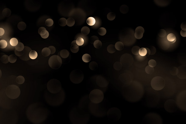 豪华的金色散景在黑色的背景上素材图片