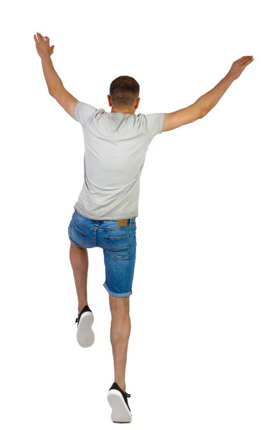 一个穿着短裤跳舞的男人的侧视图。图片下载