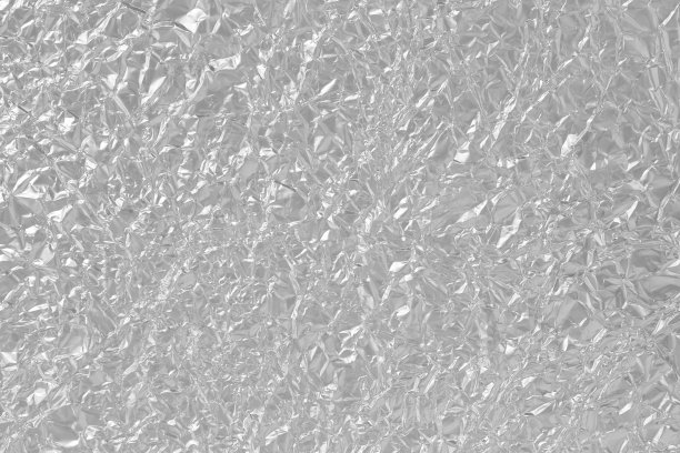 闪亮的银箔金属纹理，抽象的灰色包装纸为背景和设计艺术作品。图片下载