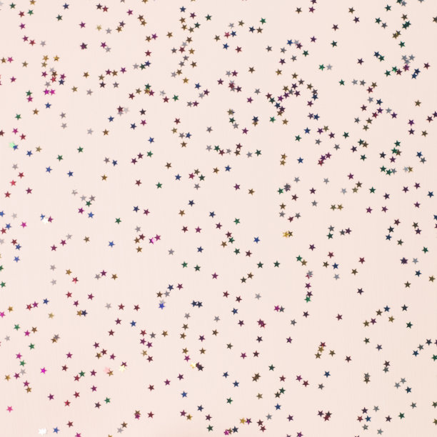 粉红色的背景和闪亮的星星。圣诞节和新年的概念。图片下载