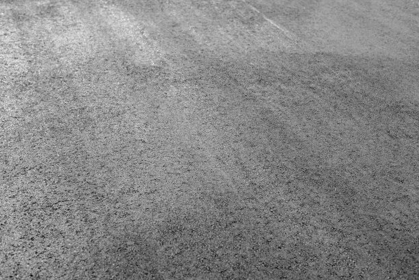 路面沥青为背景。图片下载