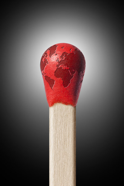 全球变暖。地球仪在比赛中。图片下载