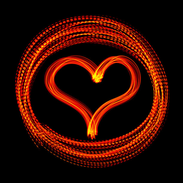 发光的红心在一个圆圈- LED光画图片下载