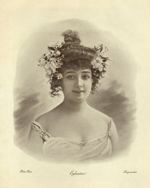 头发上插着玫瑰花的漂亮女人的古董照片图片下载