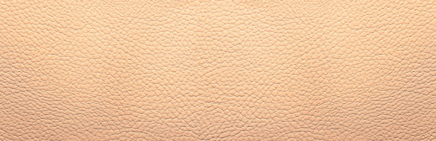 米色真皮背景。全景。图片下载