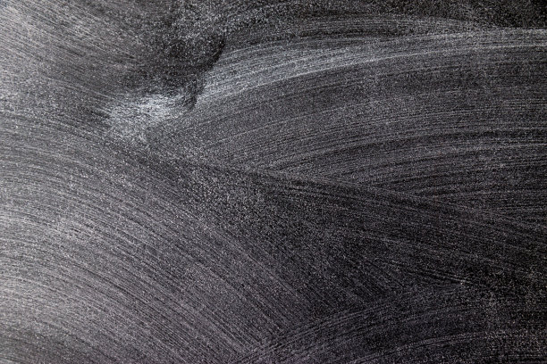 灰色装饰石膏特写纹理背景。粉笔板特写。图片下载