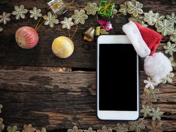 带圣诞帽的智能手机图片下载