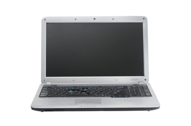 旧笔记本电脑靠近白色的背景图片下载