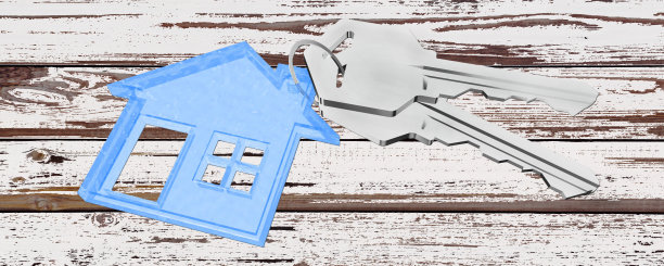 3D钥匙圈与房屋吊坠在木制背景图片下载