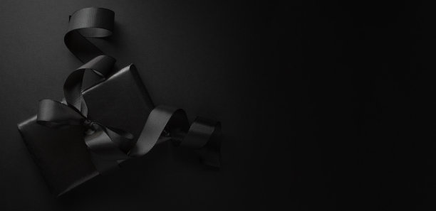 黑色背景上的黑色礼物图片下载