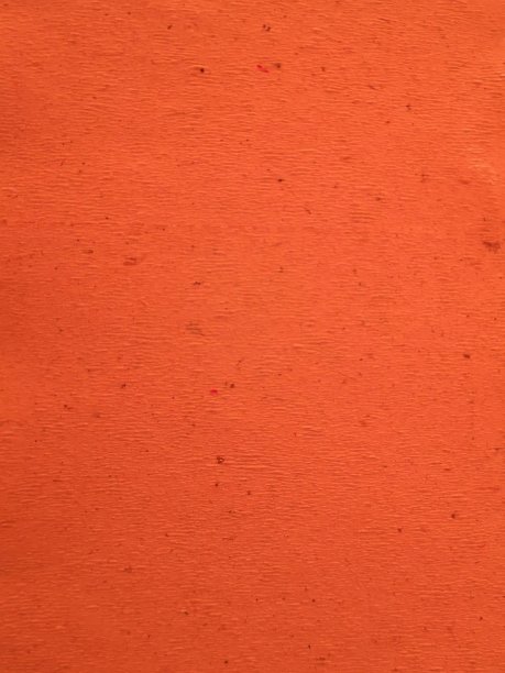 背景来自粗糙处理的亮橙色纸图片下载