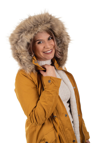 穿着芥末色夹克的迷人女人图片下载