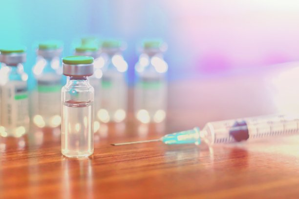 疫苗瓶剂量流感注射药物针筒注射器，医学概念接种疫苗皮下注射治疗疾病护理医院预防免疫疾病疾病婴儿儿童。蓝色背景图片图片下载