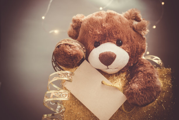 有泰迪熊的圣诞贺卡。带着节日的装饰和礼物图片下载