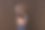 穿着牛仔裤和黑色上衣的孕妇双手搭在深棕色的腹部上。怀孕、分娩、准备和期望概念。美丽柔情的怀孕照片图片下载