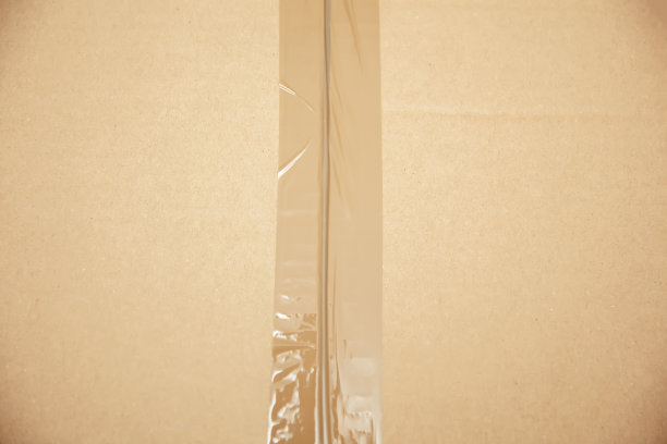 用透明包装胶带密封的纸板盒图片下载