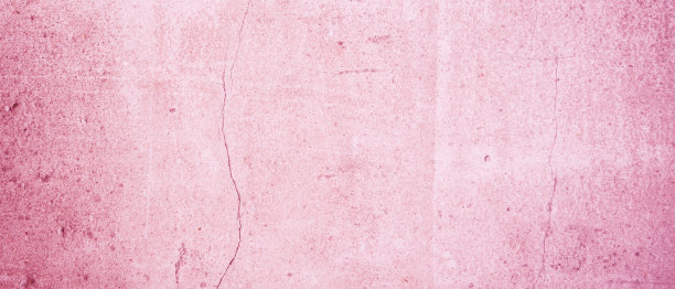 混凝土垃圾背景在粉红色-美丽的对比纹理水泥表面与裂缝在一个肮脏的粉红色颜色图片下载
