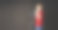 一个穿着红色足球的小男孩站在一个大望远镜旁边。图片下载