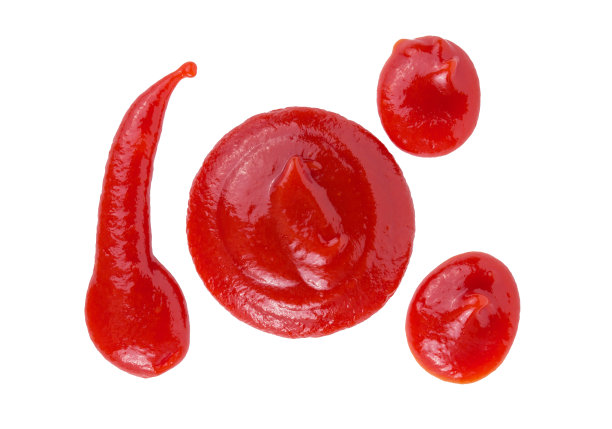 红色的番茄酱溅在白色的背景上，图片下载