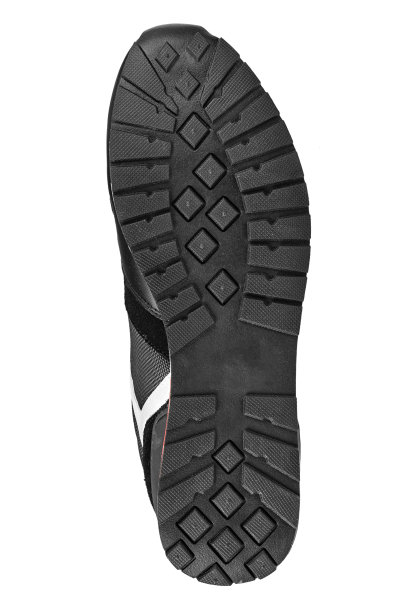 运动鞋的黑色鞋底孤立在白色背景上。图片下载