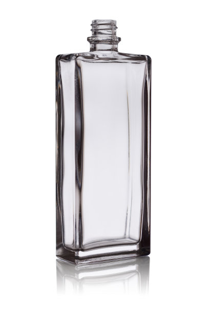 空玻璃香水瓶孤立在白色的背景反射。图片下载