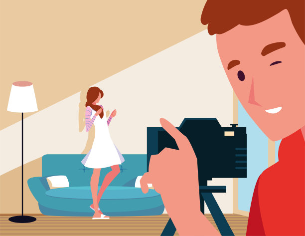 一名男子在摄影棚里为模特拍照图片下载