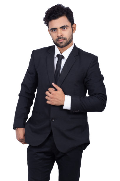 一幅自信的印度商人站在白色背景下的肖像图片下载