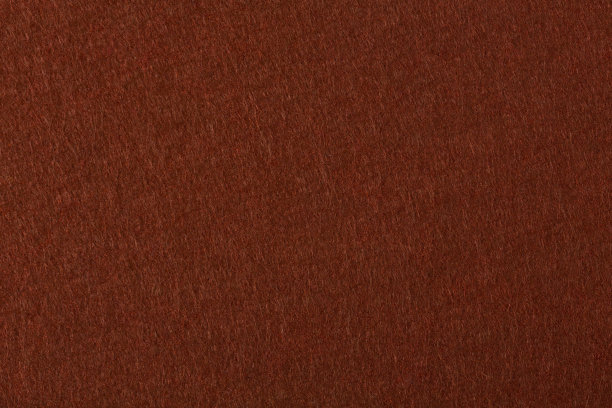 深棕色的毛毡背景。高质量的纹理在极高的分辨率。图片下载