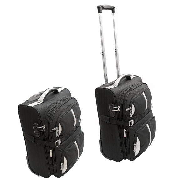 带轮子的行李箱。图片下载