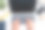 用笔记本电脑工作的高级女性的手。白色的桌子上。喝点咖啡休息一下。选择户外办公室。把手机和耳机放在身边图片下载