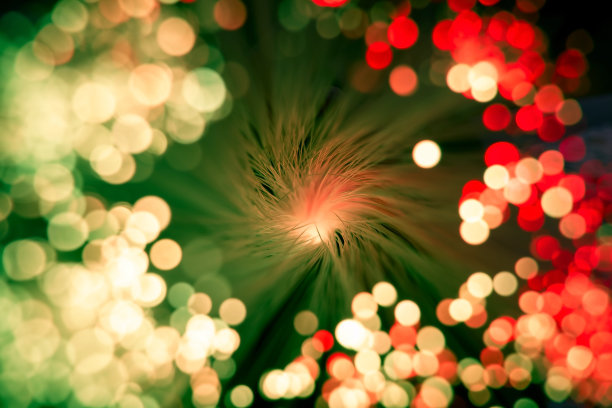 抽象的充满活力的彩色霓虹灯背景与闪亮的散景图片下载